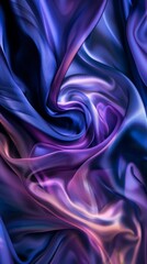 Obraz premium A purple and blue fabric with a swirl pattern