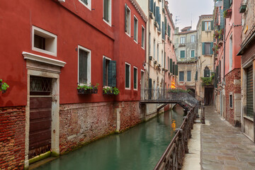 Old medieval traditional colorful houses over the canals in the early morning, Venice, Italy
