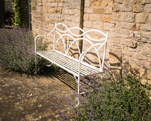 Old ornate metal garden in an English garden