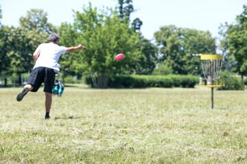 Man playing flying disc sport game