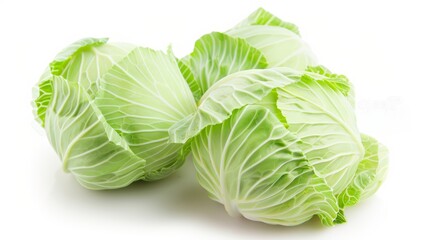Obraz premium High-res image of fresh green cabbage, isolated on white, showcasing fine details and natural texture, ideal for print and digital use, focus cover all object, deep dept of field