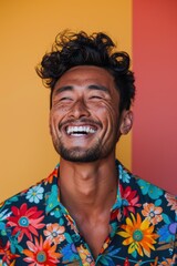 Man in Floral Shirt Beams With Joy