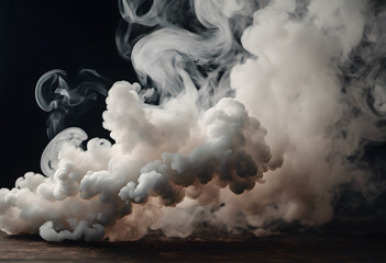 Abstract image of swirling white smoke on a dark background, creating a sense of movement and fluidity.