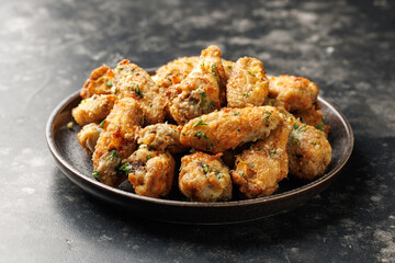 Homemade Garlic Parmesan Chicken Wings in a plate