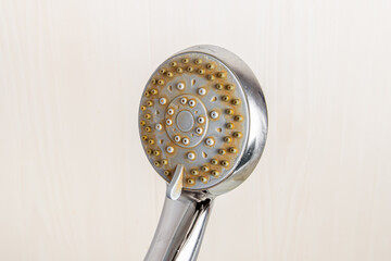 Plaque from hard water on the shower head