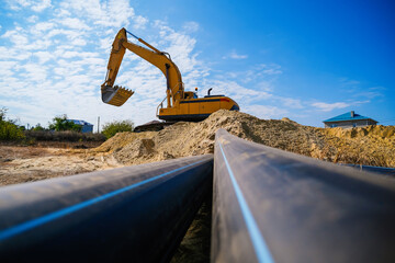 Large industrial black plastic polypropylene modern sanitary pipe on the construction site