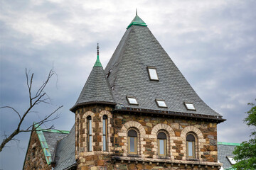 Historic Romanesque Building with Prominent Turrets in Newton, Massachusetts, USA