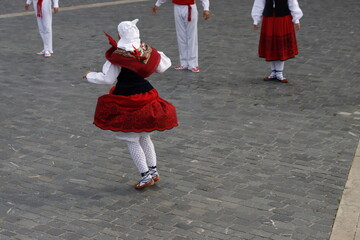 Basque folk dancers in a street festival