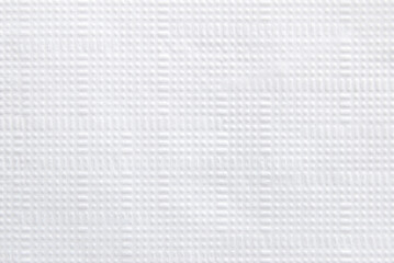 A sheet of clean tiled white tissue paper as background	
