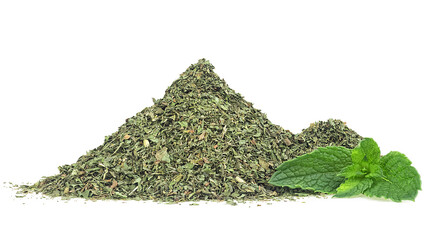 Pile of dried and chopped mint leaves and branch of fresh mint isolated on a white background © domnitsky
