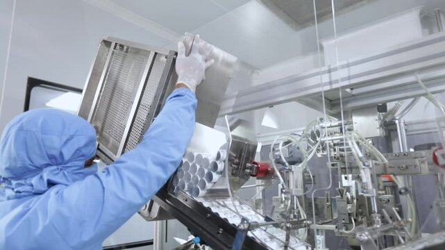 toothpaste filling machine. plastic tubes in paste filling machine. cream, ointment, gel filling machine. sealing plastic tubes, filling and sealing tubes automatic. pharmaceutical production	