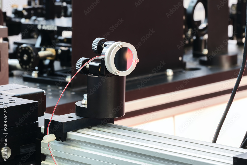 Leinwandbilder experiment with laser device in optical laboratory. experiment in optic lab with laser device.