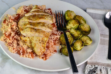  seasoned chicken breast with rice roasted brussel sprouts