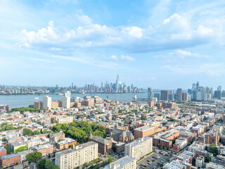 Fototapeta premium Aerial View of Hoboken downtown and Manhattan Skyline on the background.