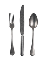 Modern cutlery with antique effect. Cutlery set with Fork, Knife and Spoon Isolated on white with clipping path.