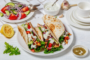 grilled chicken street tacos on a white plate
