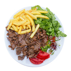 Turkish cuisine. Doner kebab meat with pommes frites potatoes, salad, tomatoes and rice on plate. Top view and isolated on white