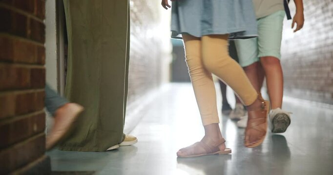 Kids, school and walking in hallway, feet and active with summer, happiness and learning. Shoes, students and children in lobby, education or break with growth, corridor or friends with energy or joy