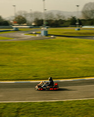 Focused karting driver, determined to win the competition.