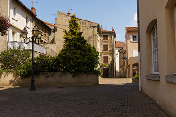 A Quiet Corner in Langeac, France: A Stone Street Under a Summer Sun