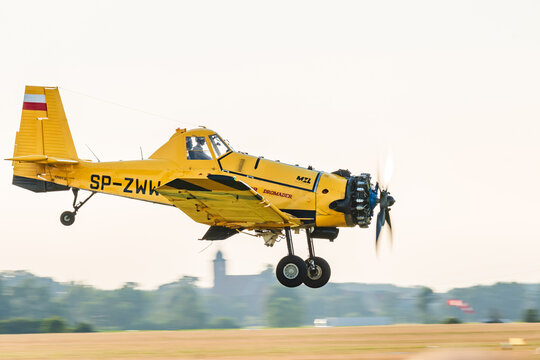 Leszno, Poland - June, 22, 2024: Antidotum Airshow Leszno, PZL M18 Dromader firefighting plane. The pilot flies low over the airport in front of the audience.