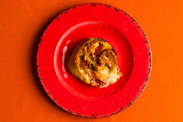 Pepperoni roll on a plate
