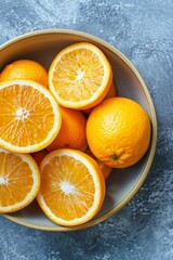 Fototapeta premium Fresh Sunkist Orange in a bowl, Top View, Golden Ratio, Natural Light