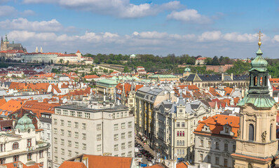 Naklejka premium panorama of Prague with red roofs from above summer day , Czech Republic