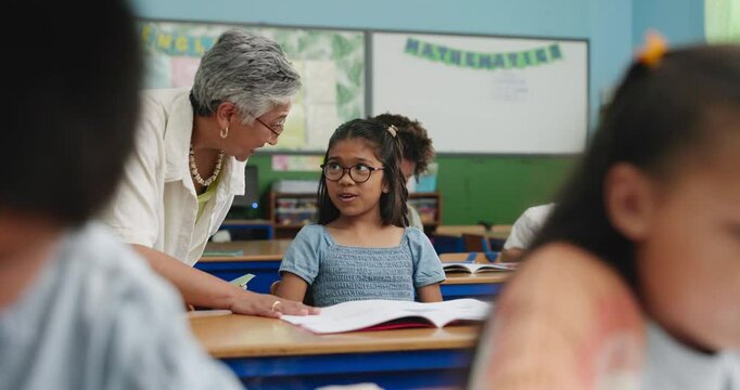 Development, education or high five with teacher and student in classroom for success or support. Homework, motivation and well done with woman talking to girl child in class for school study