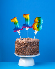 Air balloon number 118 - Birthday cake on blue background