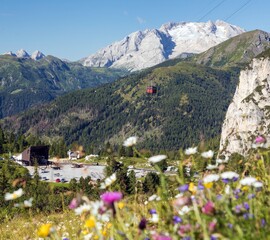 Fototapeta na wymiar Mount Matmolada and rope way, Dolomites mountains, Italy