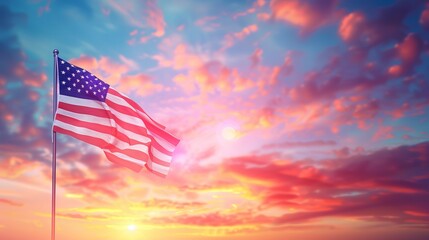 Obraz premium The American flag flying proudly against a dramatic, colorful sunset sky, symbolizing the enduring spirit of the nation and the natural beauty of the American landscape.