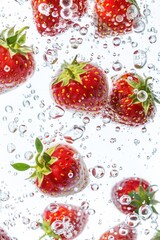 Juicy ripe strawberry fruit in water with bubble