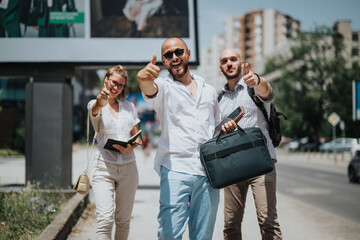 Group of happy businesspeople giving thumbs up during an outdoor meeting in an urban downtown location. Positive vibes and teamwork in a city setting.