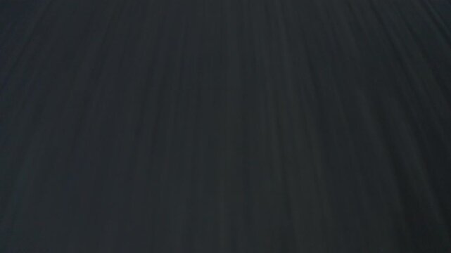 POV low angle driving on asphalt road 