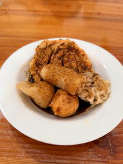 empek empek, fried fish cake with sour sauce