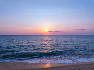 Landscape Aerial view of majestic clouds in the sky sunset or sunrise over sea with reflection in the tropical sea.Beautiful landscape scenery.Amazing light of nature Landscape nature background