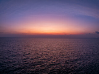 Landscape Aerial view of majestic clouds in the sky sunset or sunrise over sea with reflection in the tropical sea.Beautiful landscape scenery.Amazing light of nature Landscape nature background