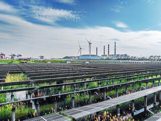 Power station chimneys, wind turbines and solar panels