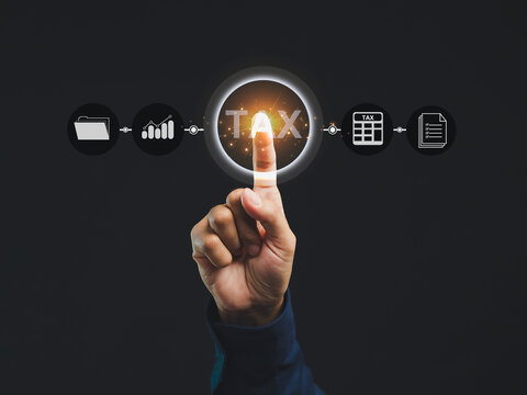 Hand touching digital tax icons - financial management technology concept.