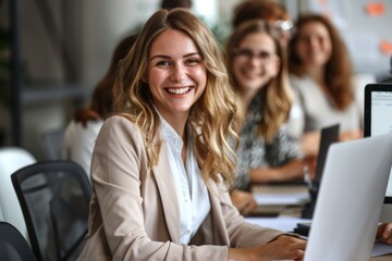 Professional Happy Young Businesswoman Manager Explaining Corporate Software through Online Learning Webinars to Young Employees Looking at Computers at Work, Enhancing Skills and Productivity