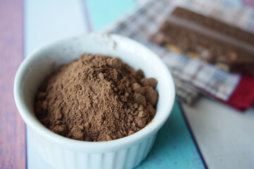 coco powder in a bowl on table,