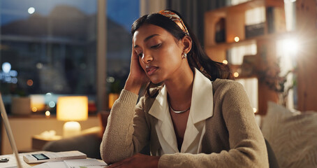 Woman, laptop and documents in home with headache, thinking or calculator for tax, budget or...