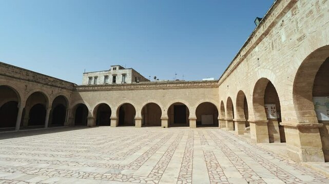 Great mosque in medieval medina of Sousse, Tunisia, North Africa. Picturesque courtyard and stairs. Old walls and arches