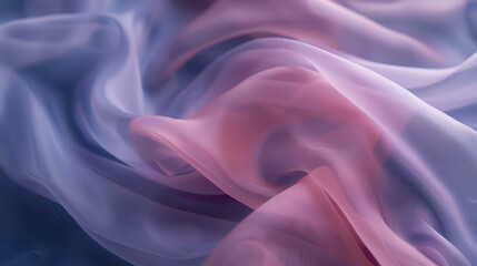 Obraz premium A soft, pastel-colored fabric draped gently on a dark surface, the folds creating a serene and calming visual