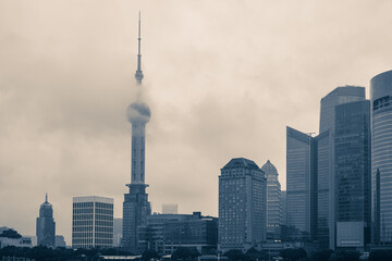 Tower over the fog; blue colortone