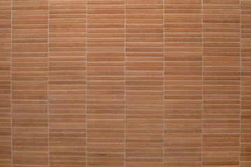 Burnt orange long narrow tile wall background for a backdrop