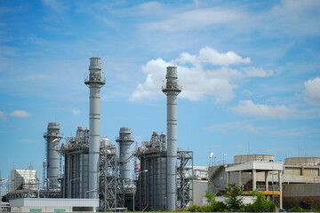 Obraz premium Power plant close up with blue sky background.