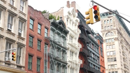 Obraz premium New York City Manhattan Soho fashion district Broom, Crosby streets, Broadway. USA urban building facade, old classic american architecture in NYC, United States. Business and residential real estate.