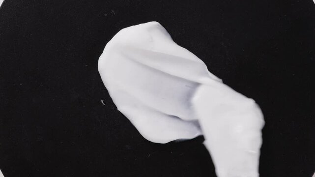 ream smear top view on black surface
